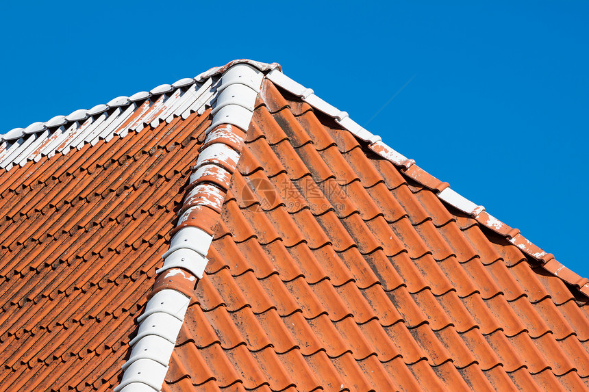有天空的红屋顶牌红色棕色房子建筑学瓷砖橙子建筑材料住宅条纹图片