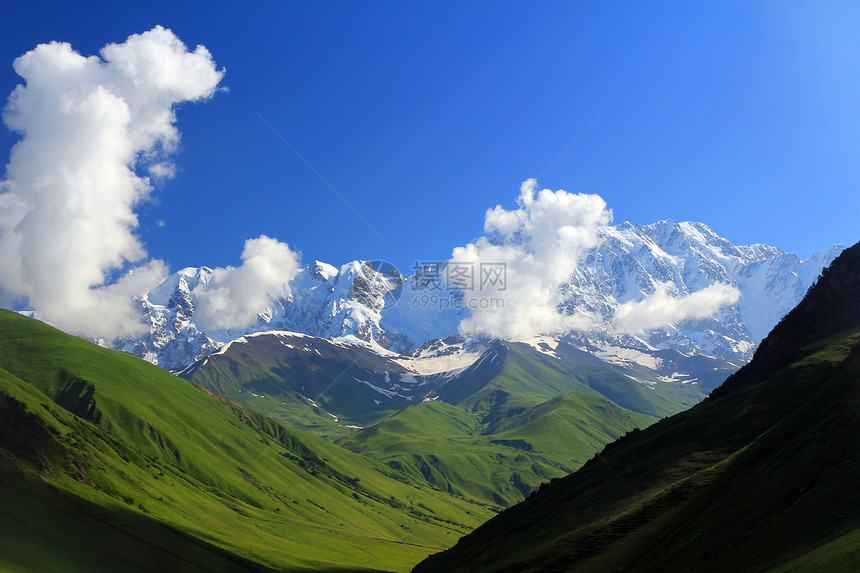 山山脉爬坡顶峰季节环境假期旅行场景国家阳光自然图片
