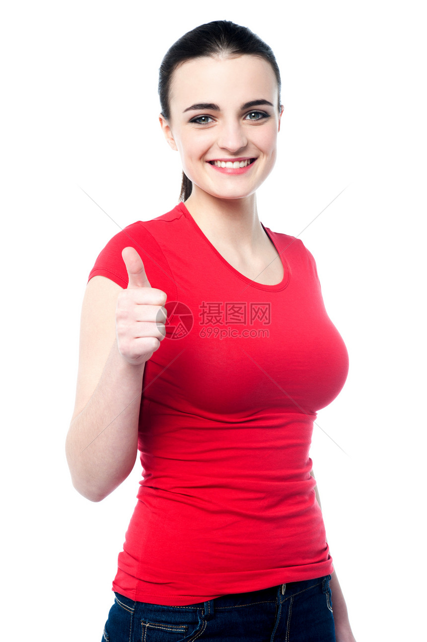 迷人的姑娘举起大拇指工作室微笑女孩女性美丽白色冒充手势快乐喜悦图片