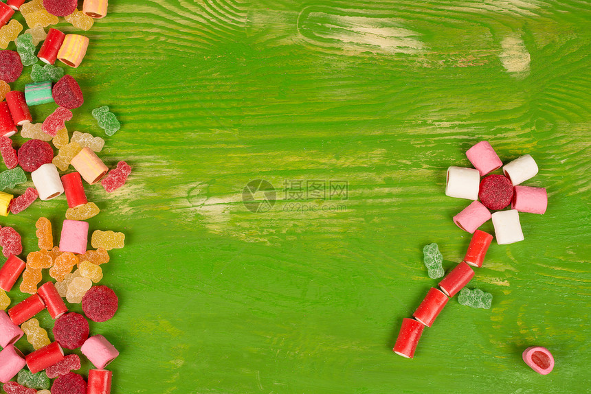 糖糖背景水平乡村静物果味绿色桌子软糖明胶视角图片