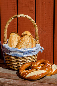 法国脆饼式法国袋式面包圈摊位植物产品主食文化食物熟食面包包子烘烤背景图片