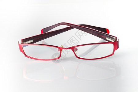 白色上的红镜光学反射黑色阅读镜片眼镜框架塑料眼睛背景图片