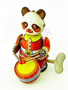 玩具鼓玩具发条熊猫音乐鼓手古董乐趣礼物背景