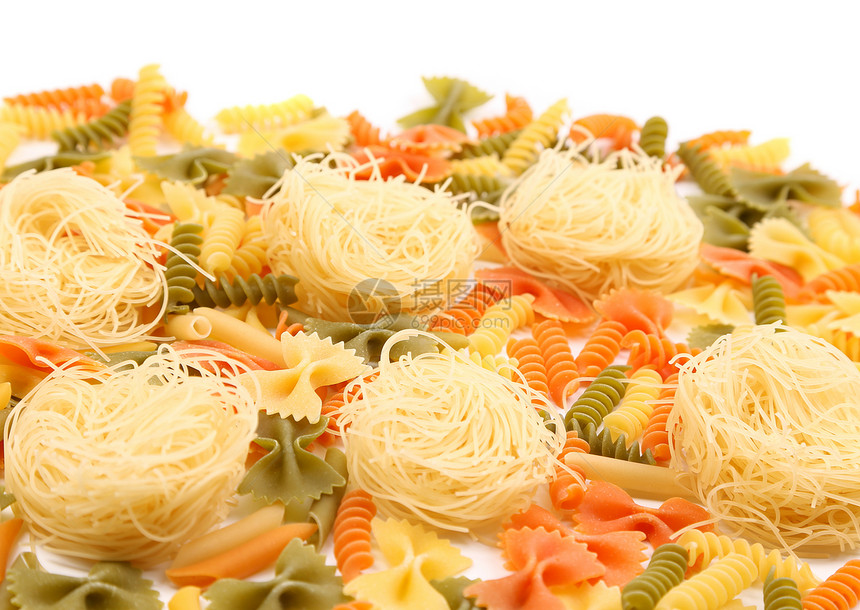 三种颜色的不同面条螺旋黄色营养品三色派对橙子绿色饺子食物图片