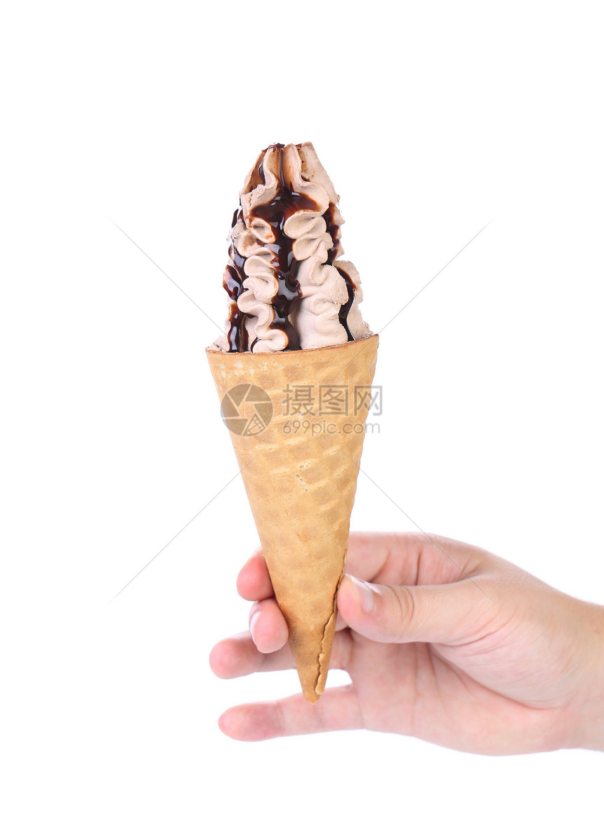 手握着冰淇淋和巧克力托普图片