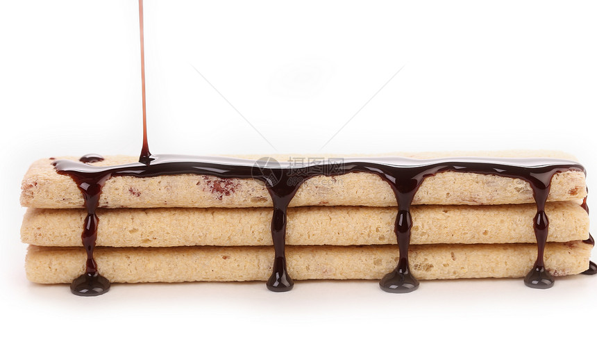 饼干口味的串流巧克力黄色巧克力蛋糕甜点溪流食物白色糕点金色红色图片
