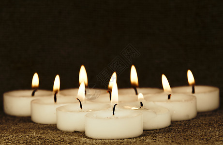 蜡烛燃烧火焰烛光背景图片