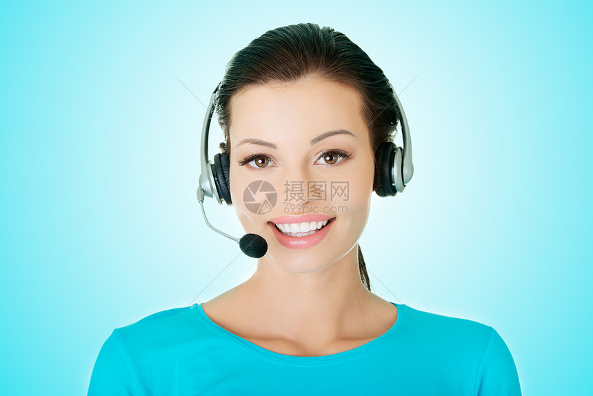 美丽的年轻青年呼叫中心助理电话蓝色推销操作员商务女性接待员助手耳机代理人图片