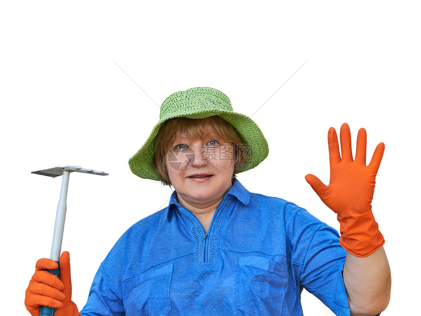 戴花园工具手套的高级女性图片