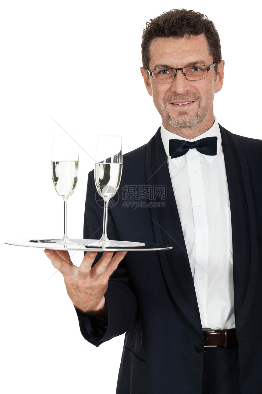 两杯香槟的男成年男服务员 隔离开来职员庆典食物金属玻璃酒精餐厅成人男人酒店图片