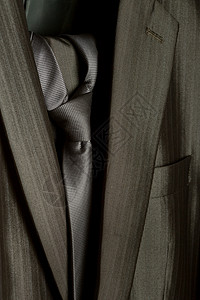 男西装公司成人服装燕尾外套灰色男性男士夹克裙子领带背景图片