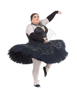 变装皇后龙女皇在礼裙里跳舞平衡展示男人胖子喜剧脚尖舞蹈家姿势艺人纱布背景