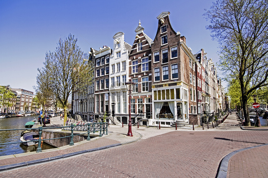 荷兰阿姆斯特丹运河沿线的中世纪住房 97运河建筑历史旅游房屋建筑学城市房子首都街道图片