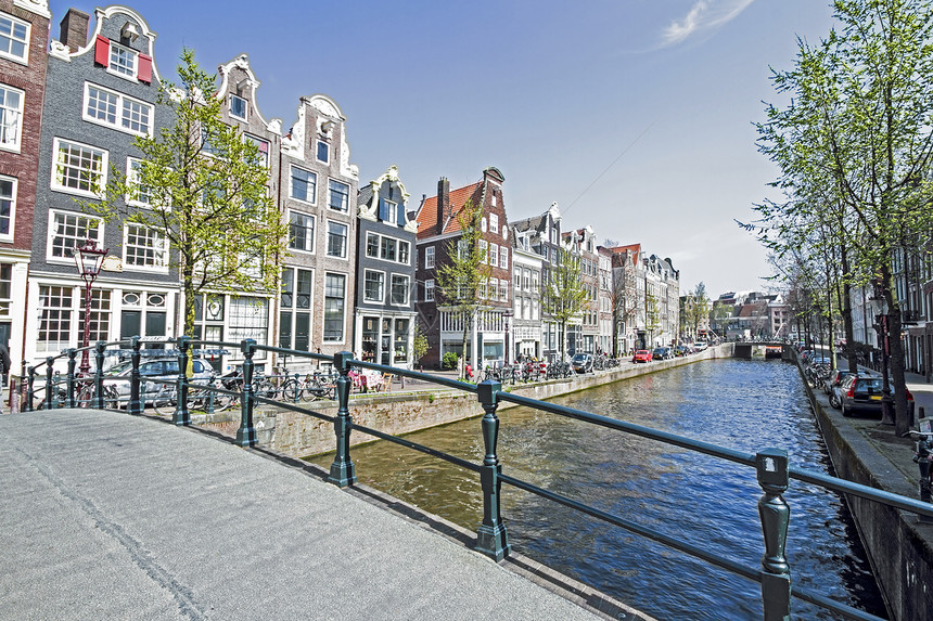 荷兰阿姆斯特丹运河沿线的中世纪住房 97街道运河首都石头房子建筑学旅游旅行建筑城市图片