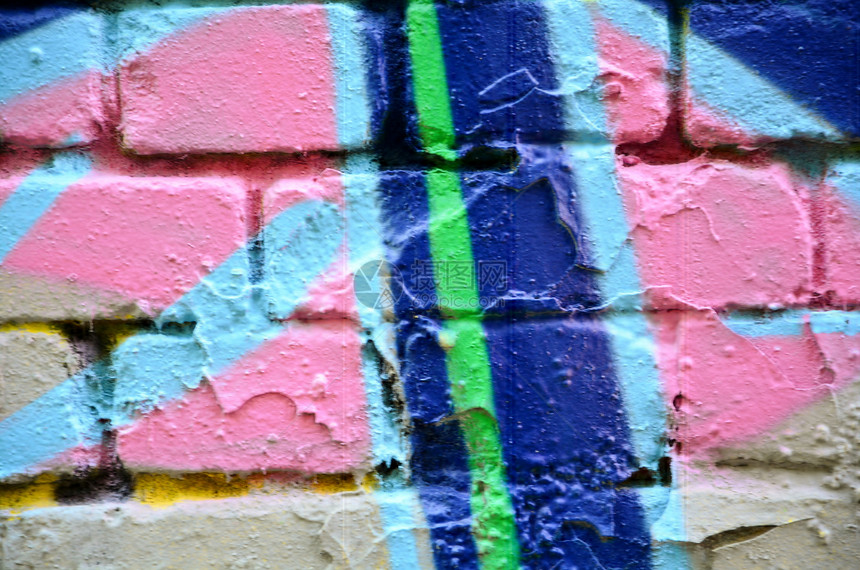 涂满多彩涂鸦的旧砖墙城市创造力艺术图片