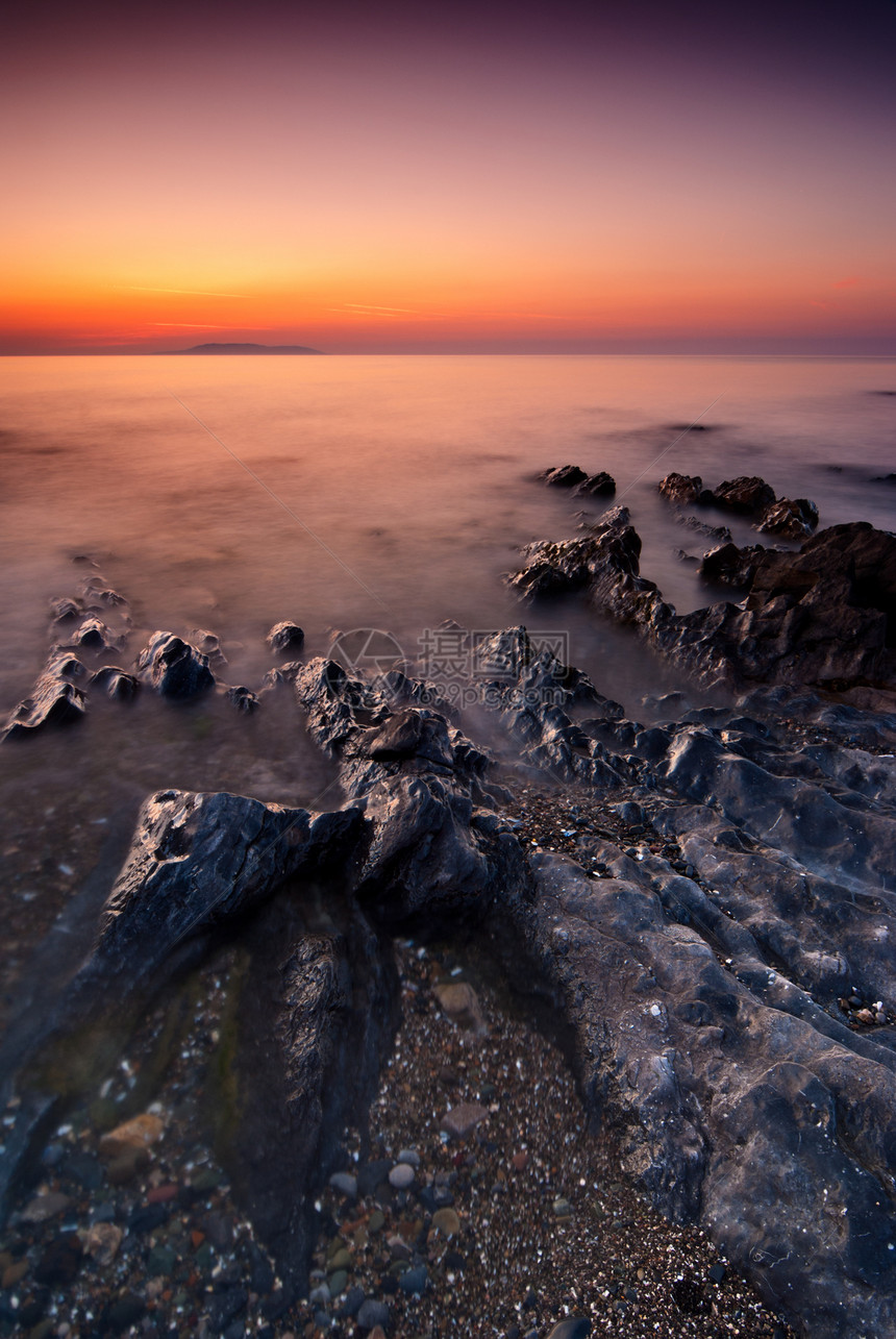 马拉希德的日出天气地平线假期风景海滩海洋日落支撑石头场景图片