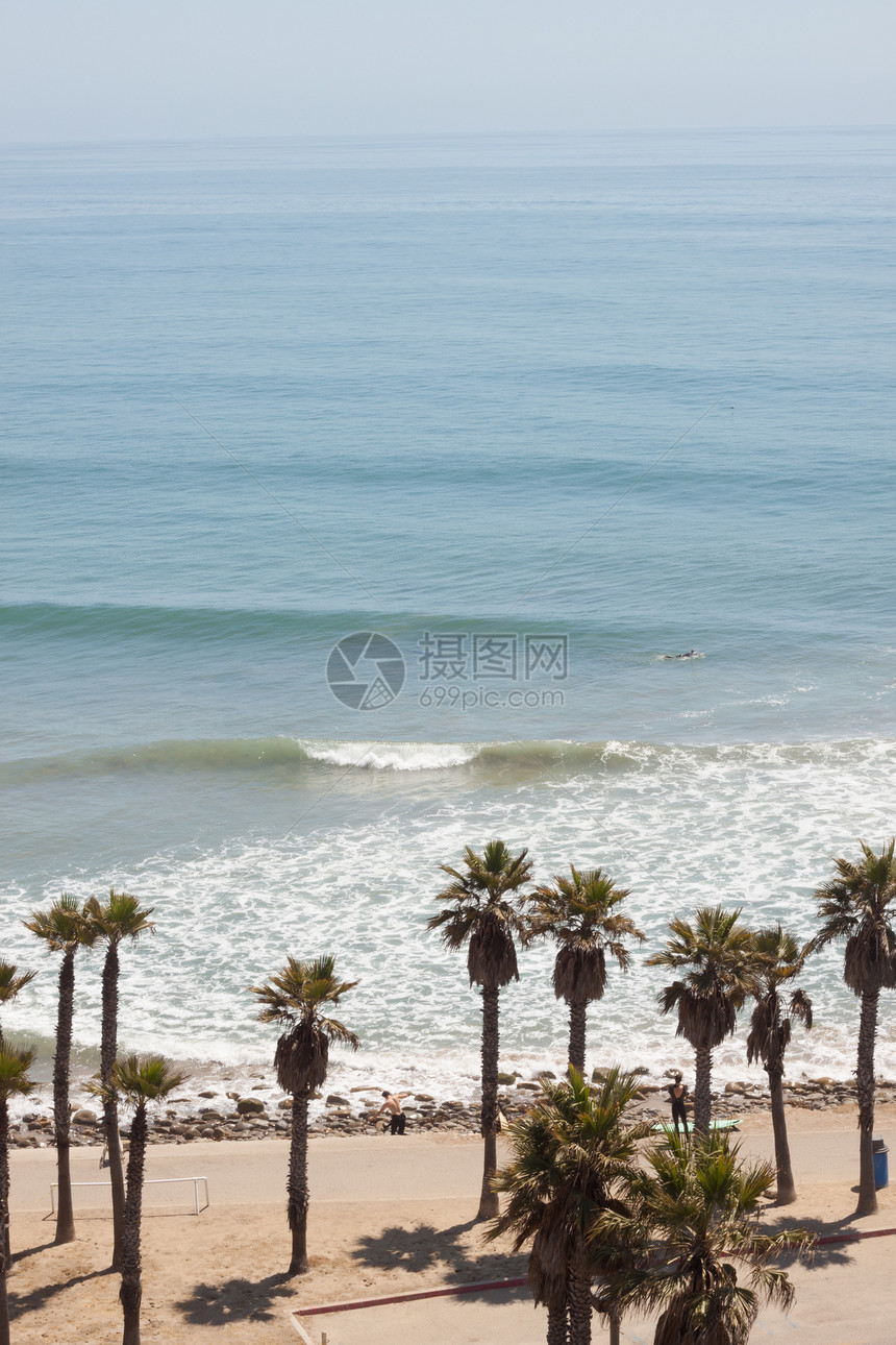 海滩景点步道冲浪者潜水冲浪板棕榈海洋划桨人行道波浪海浪图片