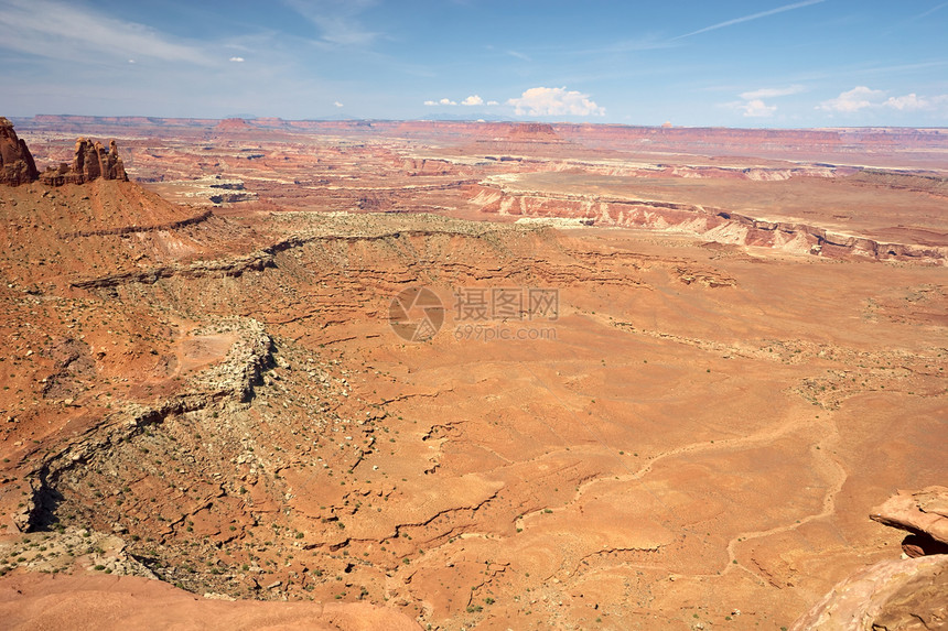 峡谷地砂岩岩石踪迹荒野干旱天空编队风景土壤蓝色图片