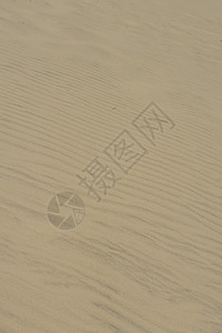 沙砂质海滩海浪侵蚀热带沙漠晴天线条阴影棕色高清图片