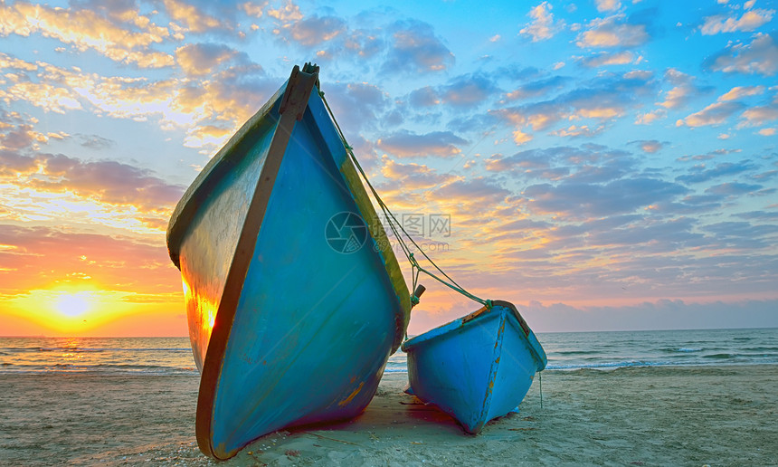 渔船假期日出热带橙子海滩娱乐珊瑚太阳海岸蓝色图片