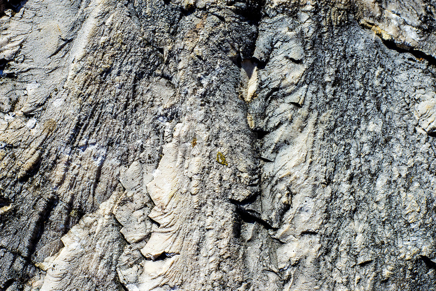 岩石表面宏观石头悬崖矿物材料纹理灰色图片