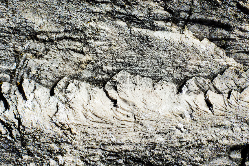 岩石表面矿物宏观纹理材料悬崖灰色石头图片