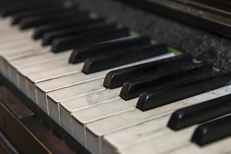 旧钢琴键键盘象牙乌木笔记细绳锤子钥匙乐器音乐背景图片