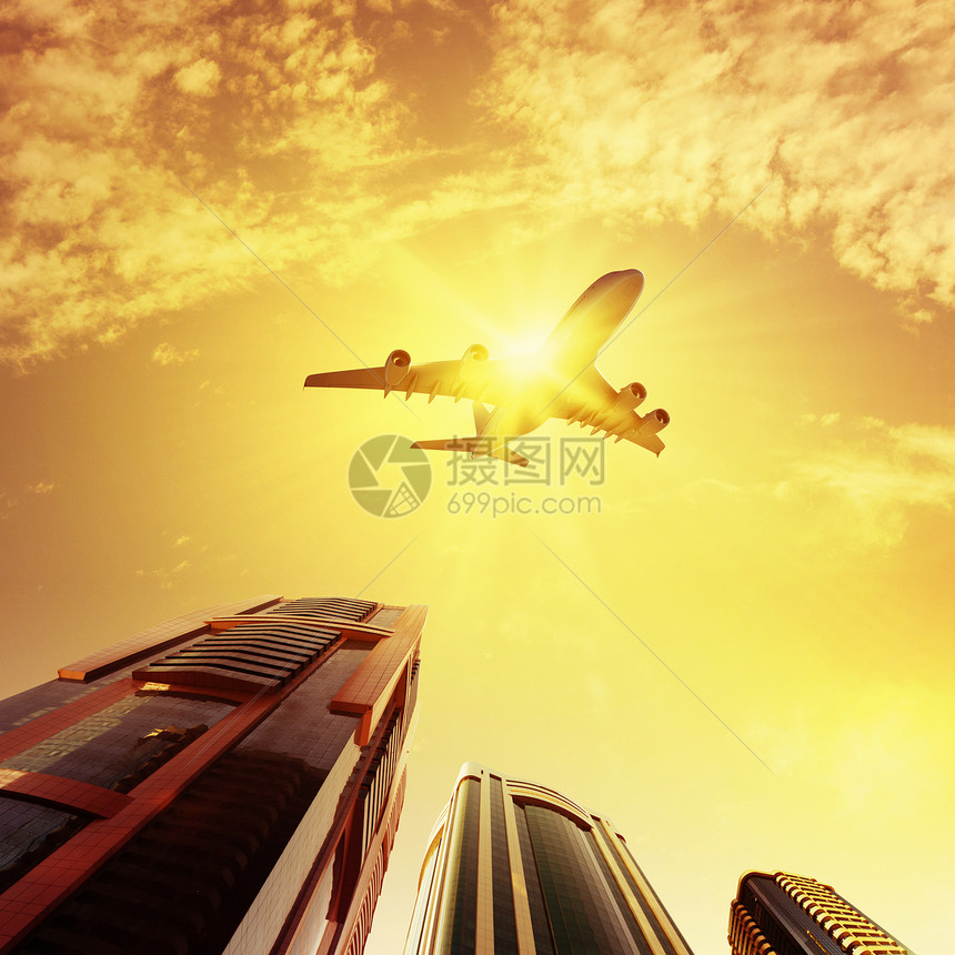 天空中的平地飞机建筑学运输城市喷射公司客机玻璃建筑地标图片