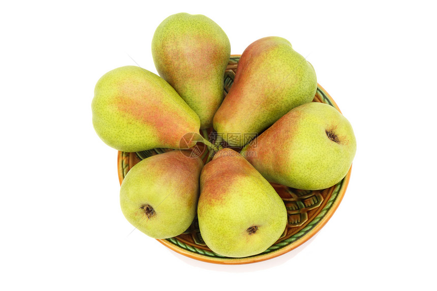 白背景的盘子上的开膛梨美味芳香园艺甜点水果维生素饮食食物图片