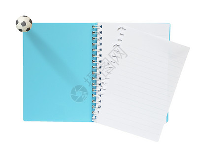 白底带塑料橄榄球的空白笔记本背景图片