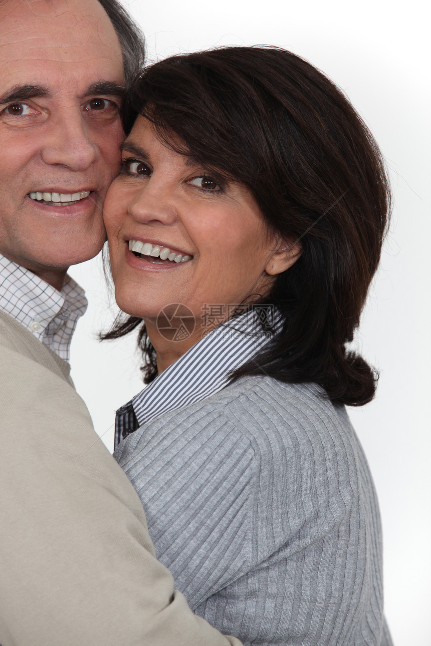 中年夫妇男人拥抱保险夫妻工作室牙科安全成人牙齿幸福图片