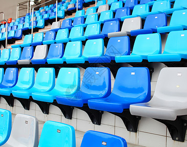 体育场的座位竞赛竞技场运动场场地塑料观众席蓝色空白楼梯运动背景图片