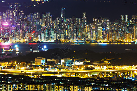 香港市晚上建筑公寓住宅景观集装箱青衣天际公寓楼摩天大楼城市背景图片