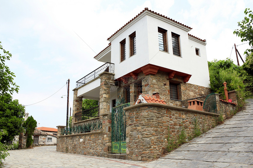 希腊古老村庄Pathenonas街街道房子历史旅游建筑岩石石头乡村建筑学旅行图片