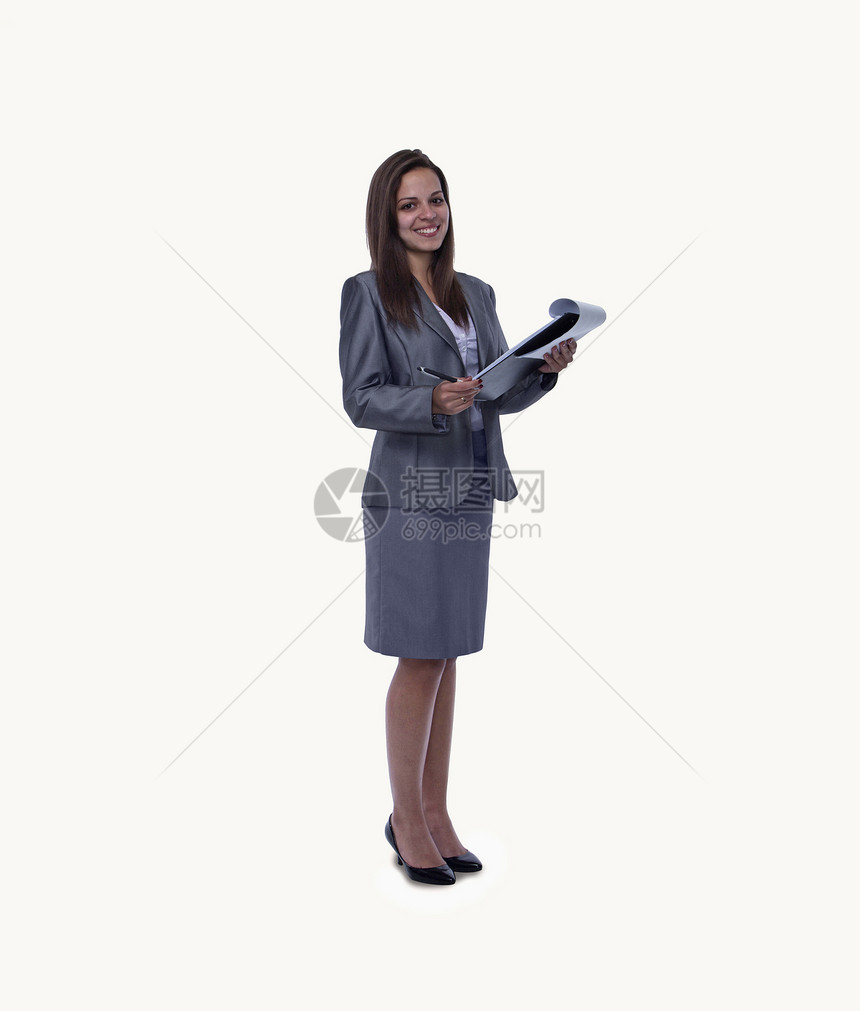 充满微笑的年轻女商务人士的肖像 带着一张张开的纸条垫 全长度 工作室拍摄图片