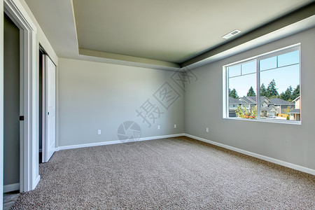 新的空房间 有米色地毯住宅天花板房地产改建房子地面背景图片