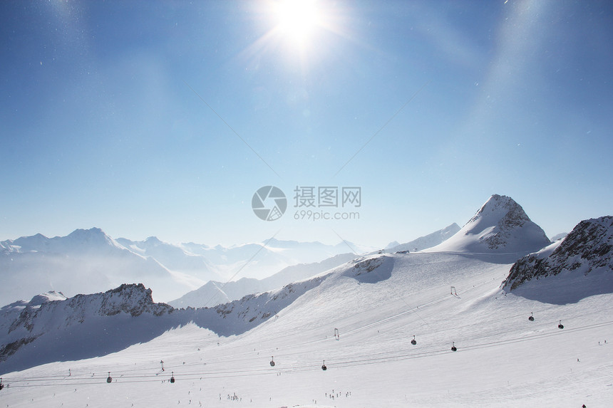 山峰峰旅行顶峰旅游环境日出高山首脑童话阳光季节图片