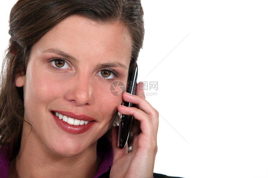 女人在手机上说话棕色珍珠女士口红头发讲话绿色细胞呼唤谈话图片