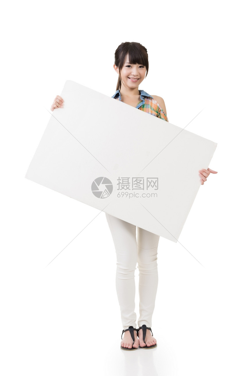 带着空白板的有吸引力的年轻亚洲女性图片