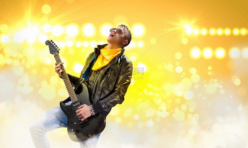 摇滚星夹克音乐会歌手艺术家电吉他热情吉他音乐牛仔裤歌曲图片