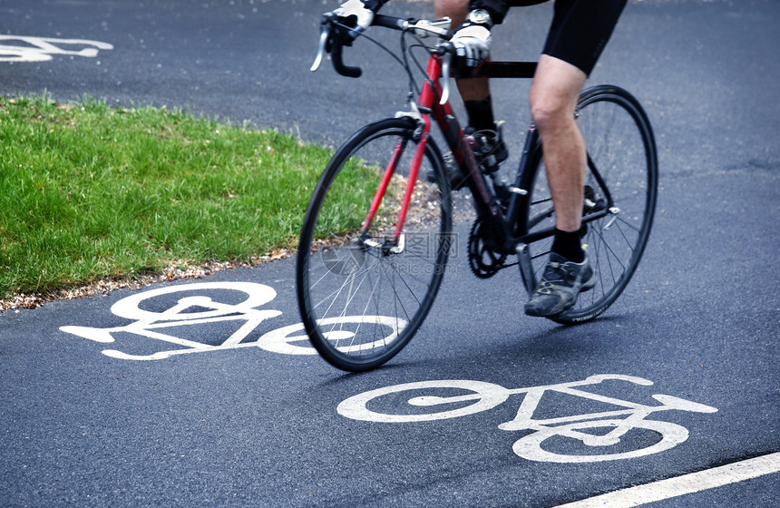 自行车车道生活方式场景环境保护城市商业城市生活骑术车轮路标土地图片