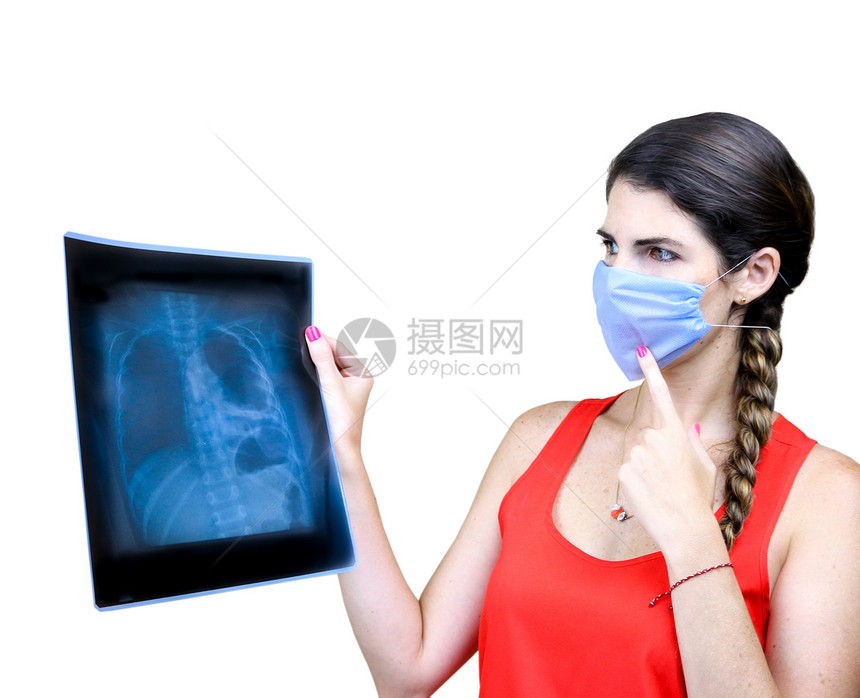 学生观看X光图像手术病人射线工作专家女士医生卫生治疗面具图片