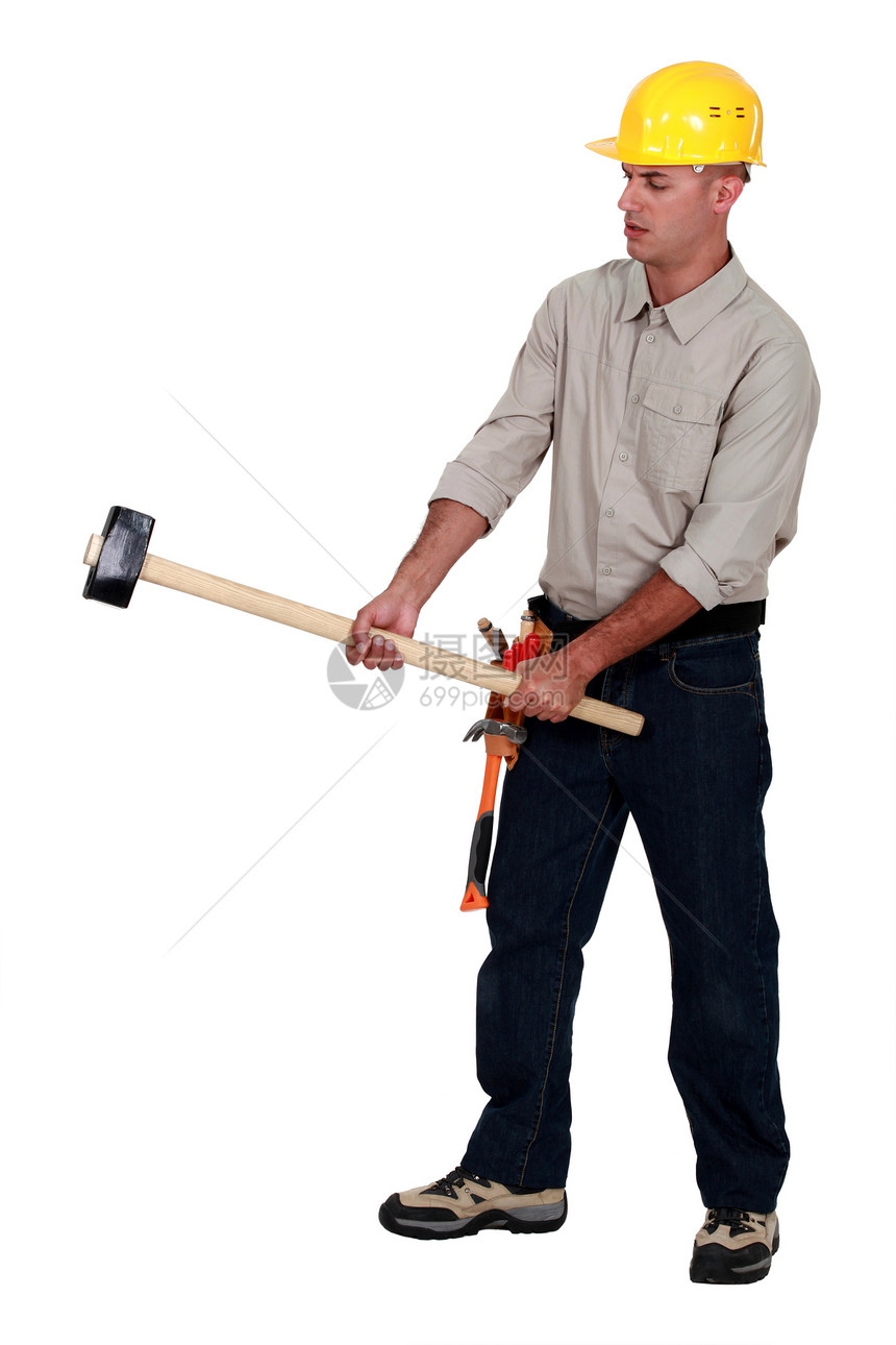 商务人士持有一个球棒不确定性工作罢工工人工具劳动者锤子人士白色衬衫图片