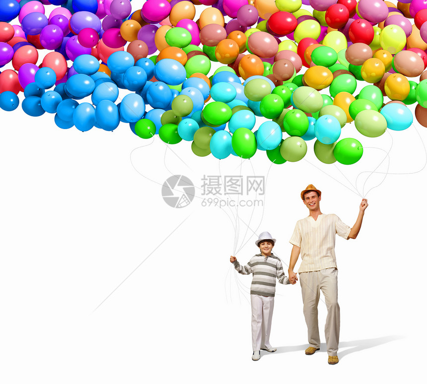 父亲和儿子喜悦幸福微笑家庭男性童年父母气球庆典孩子图片