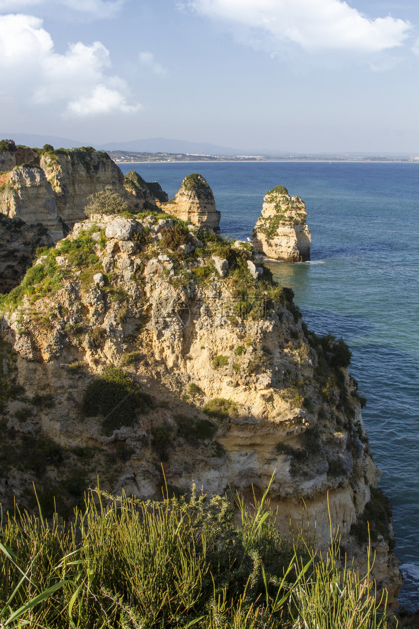 葡萄牙阿尔加夫的拉各斯海岸线蓝色岩石石头风景支撑白色海洋图片