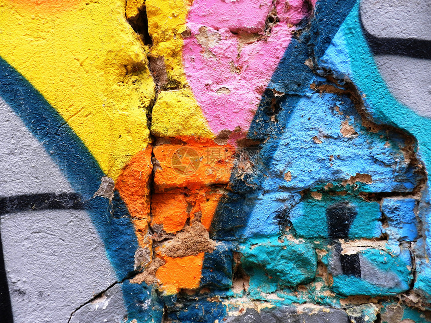 旧墙上涂着色彩多彩的涂鸦城市创造力艺术图片