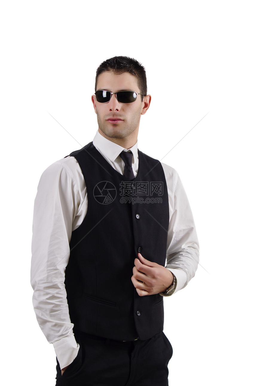 年轻商务人士放松的姿势白色色调身体眼镜套装背心领带夹克男性图片