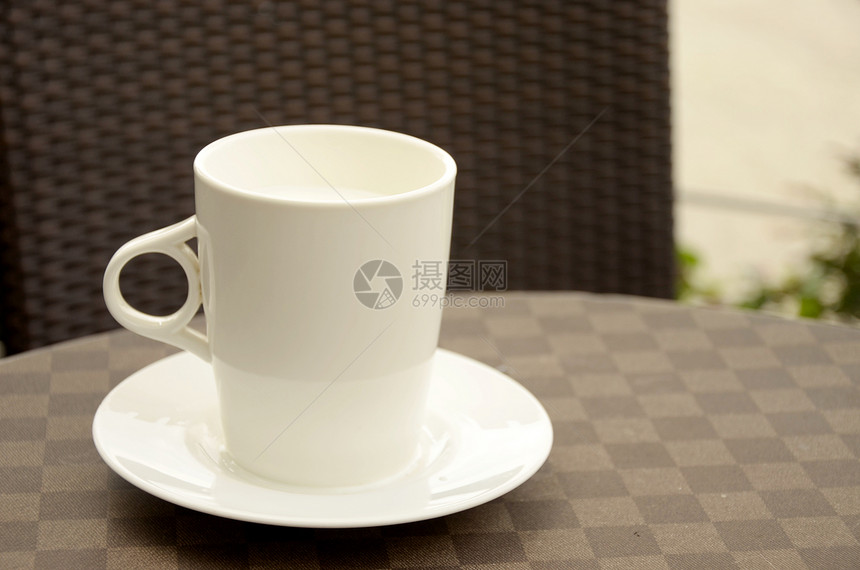 热牛奶杯低脂肪养分味道牛奶气泡医疗保健陶瓷热牛奶早餐勺子图片