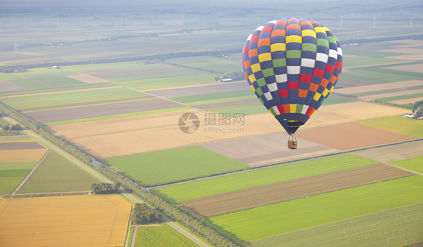 上面绿色荷兰风景的热空气气球运输冒险场地旅游篮子飞机闲暇天线天空娱乐图片