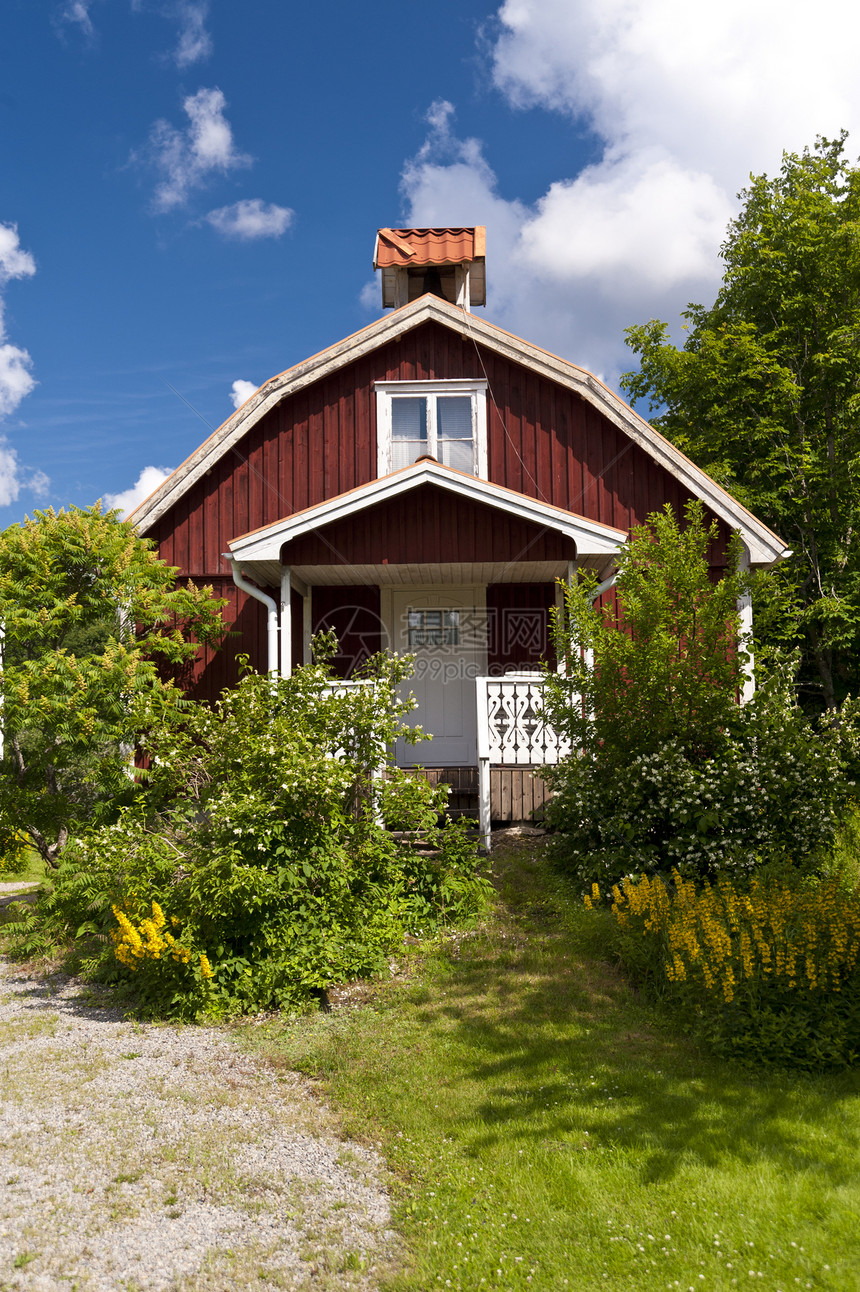 瑞典语之家住宅建筑学村庄花园绿色黄色建筑木材框架红色图片